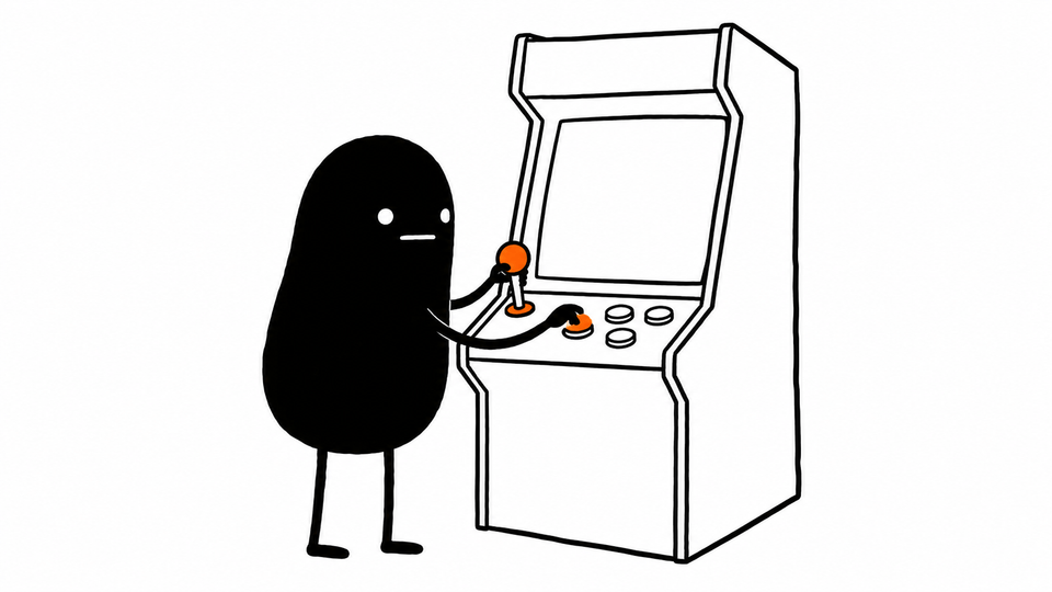 Lev plays an arcade cabinet with a blank screen, gripping its orange joystick.