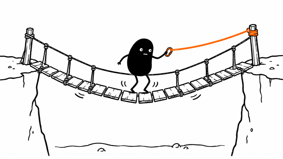 Lev bounces on a rope bridge to test it, clipped to an orange safety line.