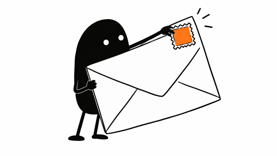 Lev presses an orange stamp onto the corner of an envelope larger than himself.