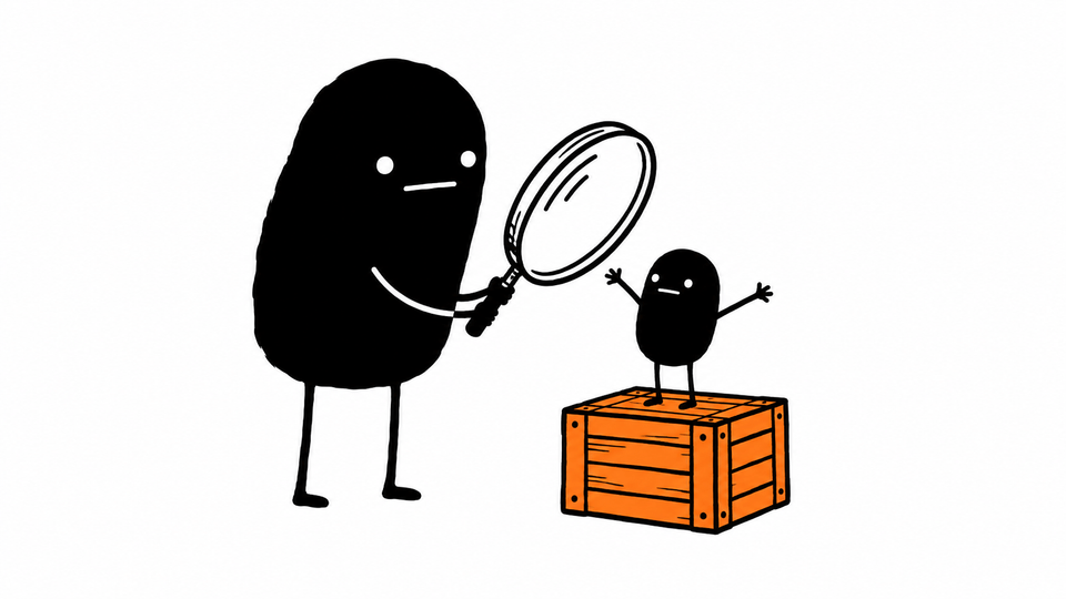 Lev holds a magnifying glass up to a tiny Lev pitching enthusiastically from an orange crate.