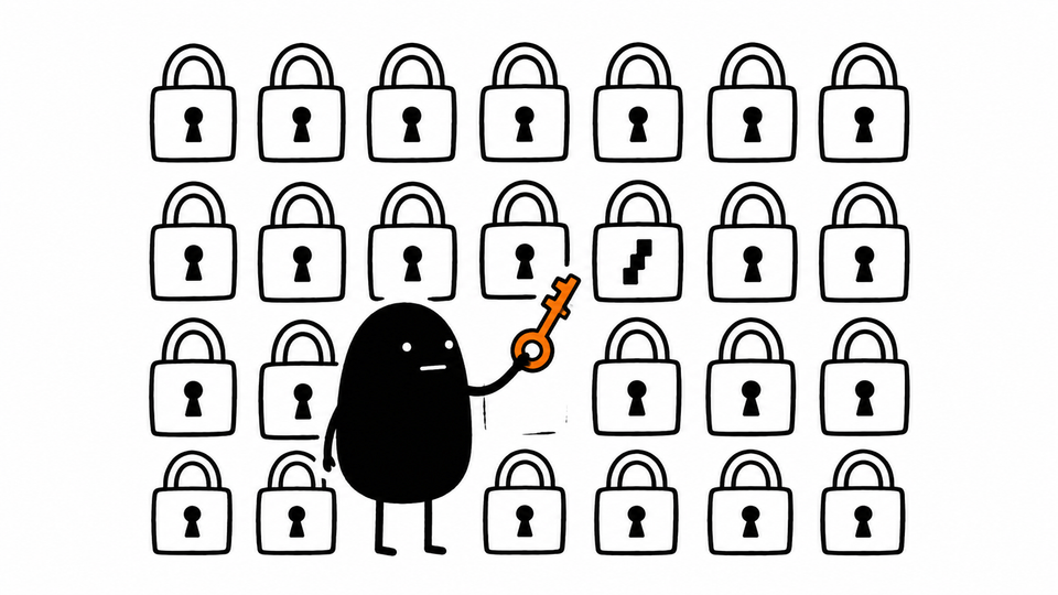 Lev holds an orange key cut for the one odd padlock in a wall of identical ones.