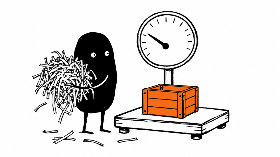 Lev holds an armful of packing straw pulled out of an orange crate, and the scale under it reads lower.